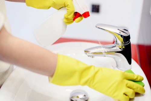 Deep cleaning a fabric sofa in Tottenham Green to remove stains and dust